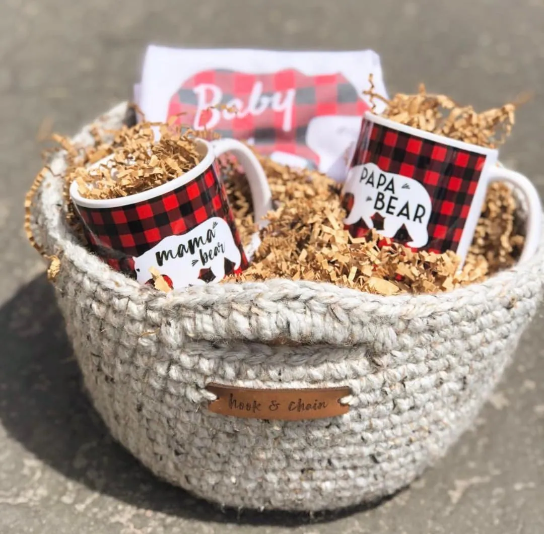 Locally made Hook and Chain basket, with custom onesie and ceramic coffee mugs